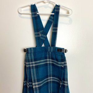 Fringe classic tartan kilt with suspenders.